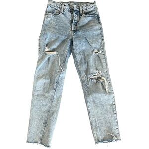 Woman’s Distressed Blue Jeans. Size 0